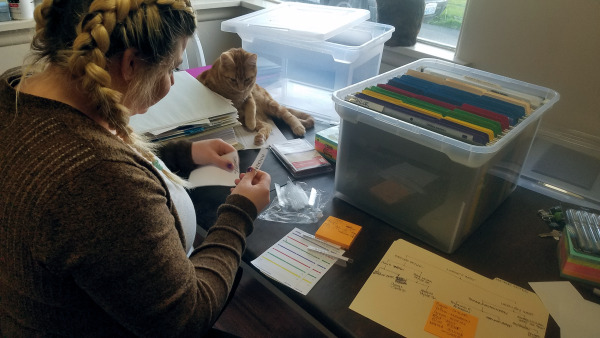 Organization - Genealogy File Setup - Lindsey West and cat - photo by Lorelle VanFossen.